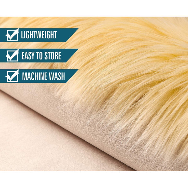 Everly Quinn Cushena Faux Sheepskin Light Yellow Rug & Reviews Wayfair